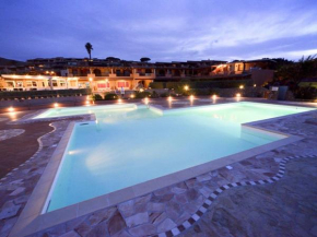Отель Tasteful holiday home in Marinella with shared pool, Маринелла